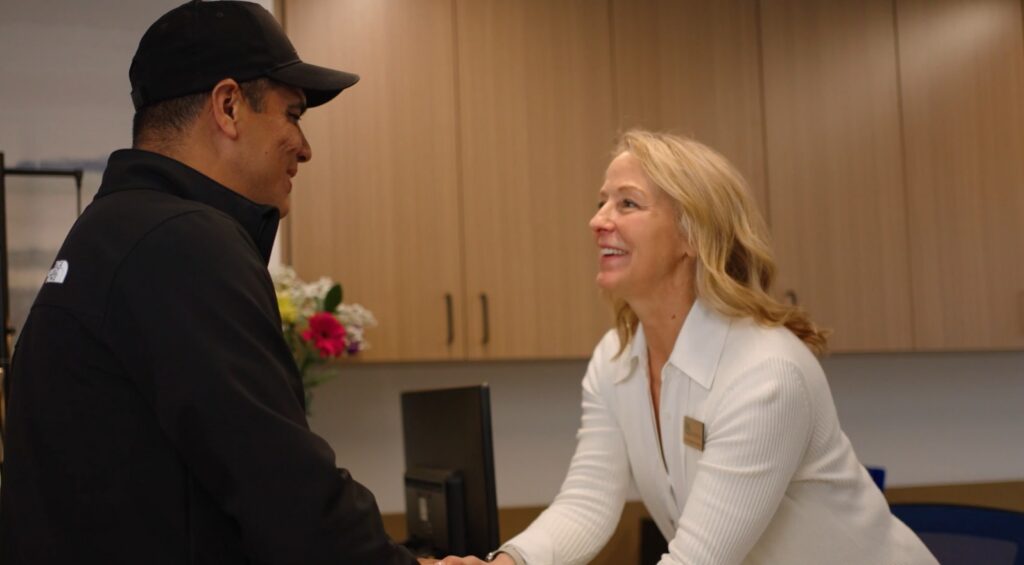 amy and javier shaking hands