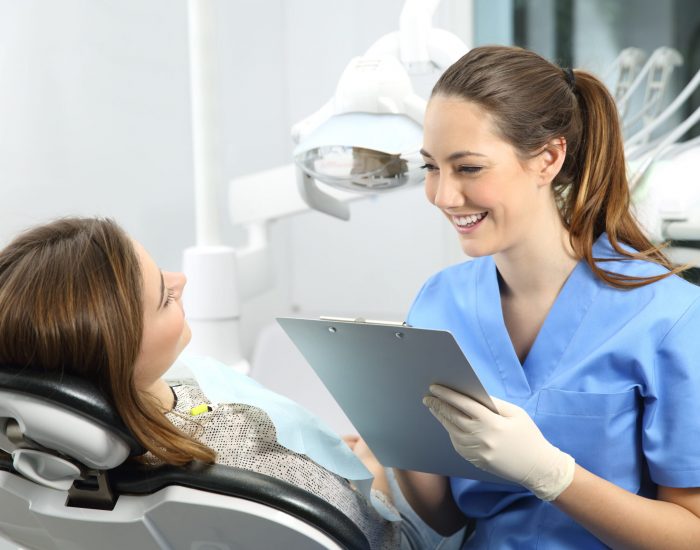 Dentist with medical history asking to a patient