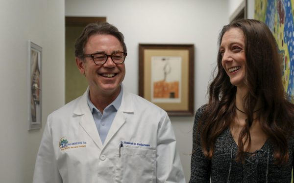 Dr. Rod VanSurksum with patient