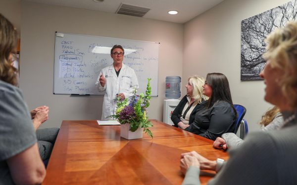 Dr. Rod VanSurksum with staff