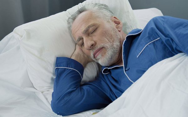 A older gentlemen sleeping